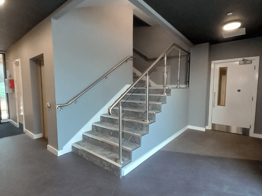 The Edge Glass Balustrade with stainless handrails